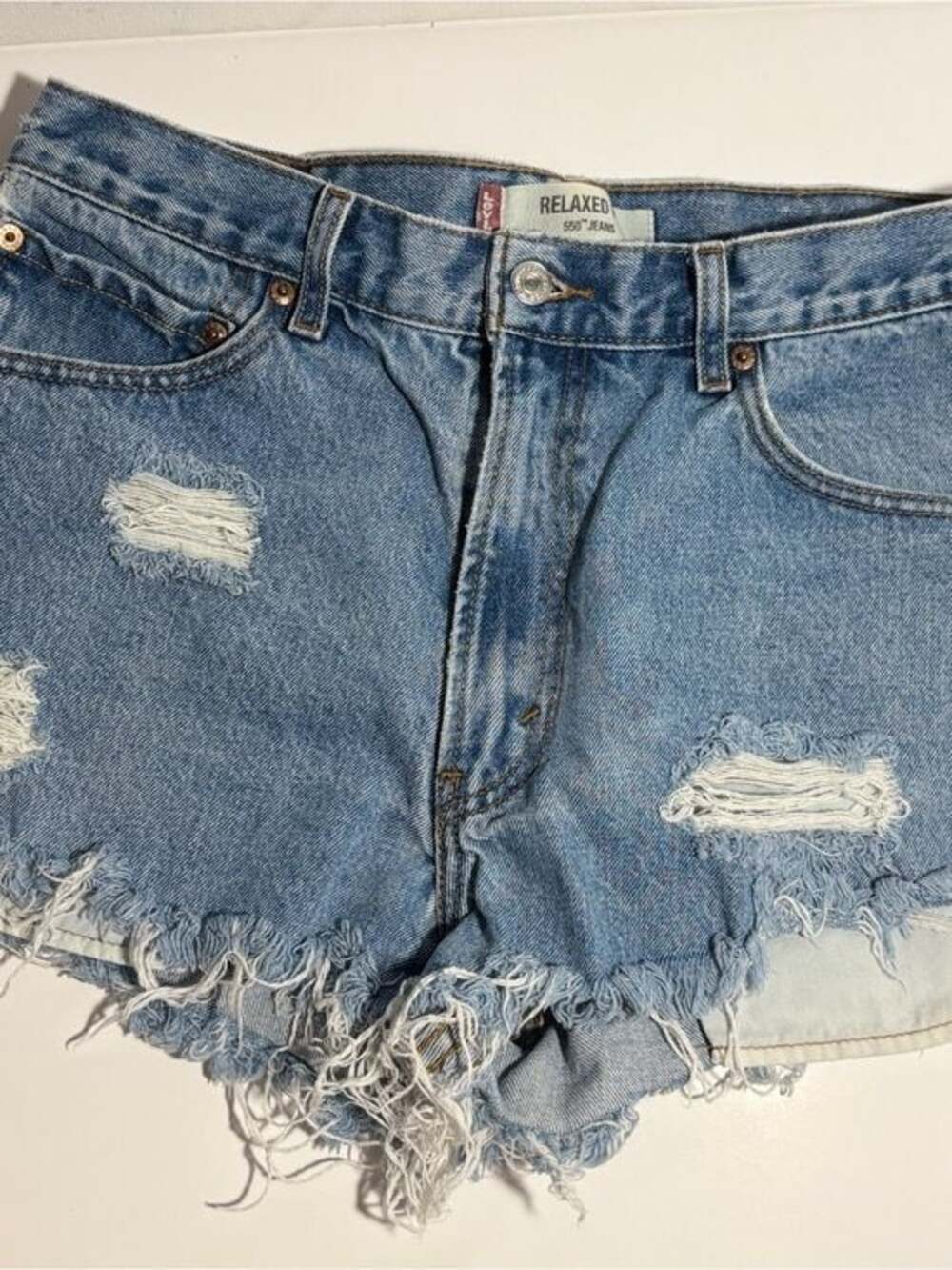 Levi's Light Blue Distressed Jean Shorts with Frayed Hem